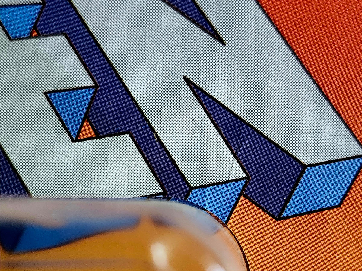 Marvel Legends X-Men Retro Collection Wolverine (Blue & Gold Uniform) 6-Inch Action Figure